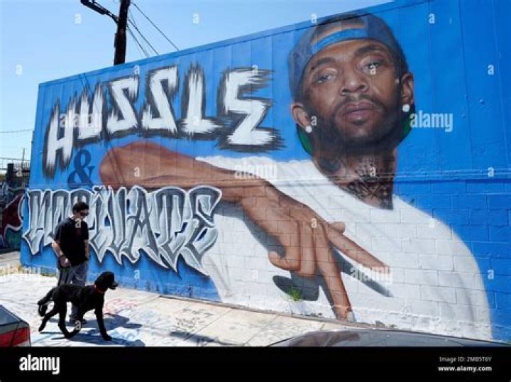 Jordyn Woods Throws Prayers Up In Front Of Nipsey Hussle Mural