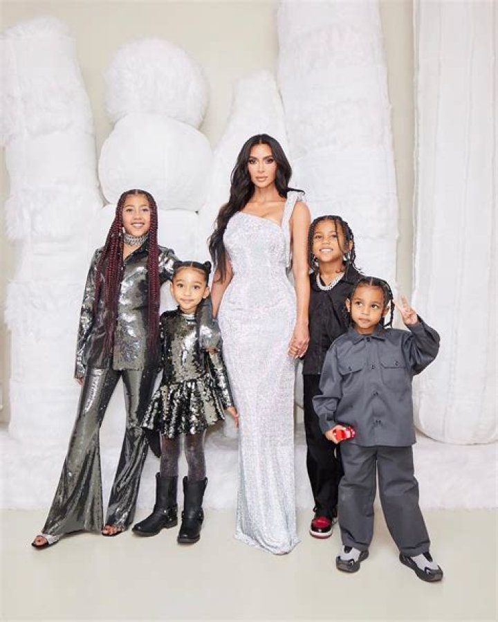 Kim Kardashian Snuggles Kids Saint, Chicago and Psalm While Munching On Cupcakes: ‘No Fighting!’