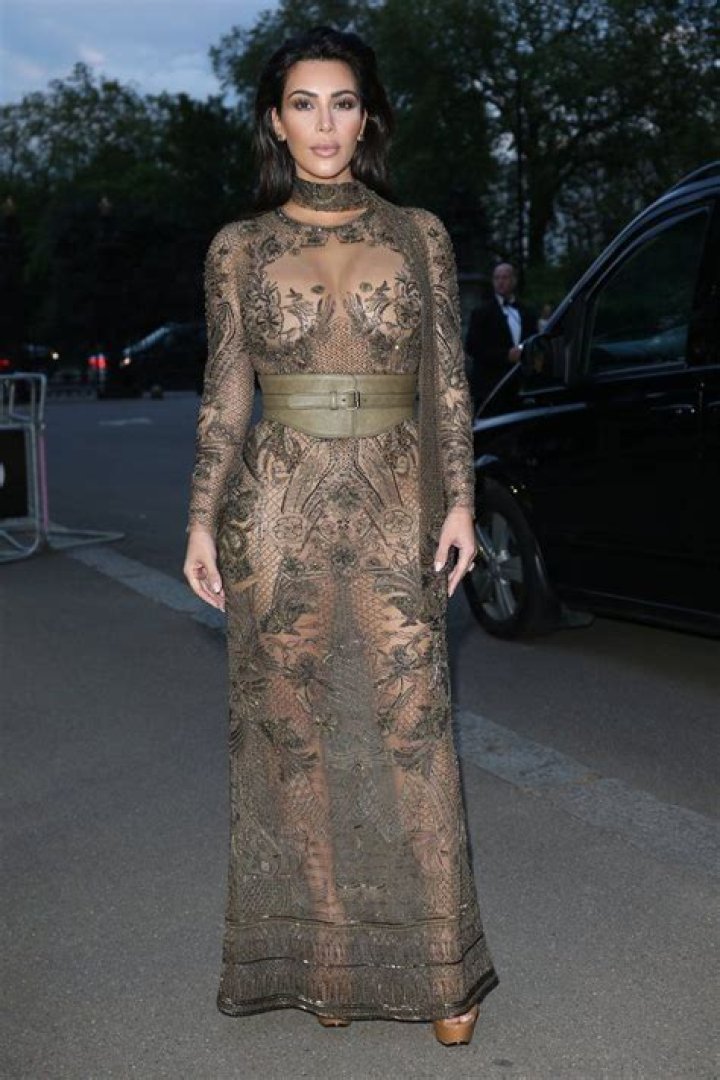 Kim Kardashian Steps Out in Sheer Lace Dress With Kanye West in Miami