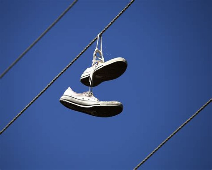 What do shoes hanging from a wire mean? – Celebrity.fm – #1 Official Stars, Business & People Network, Wiki, Success story, Biography & Quotes